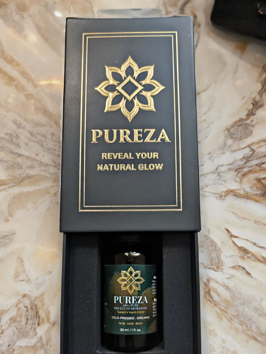 PUREZA Prickly Pear Seed oil packaging on a marble surface